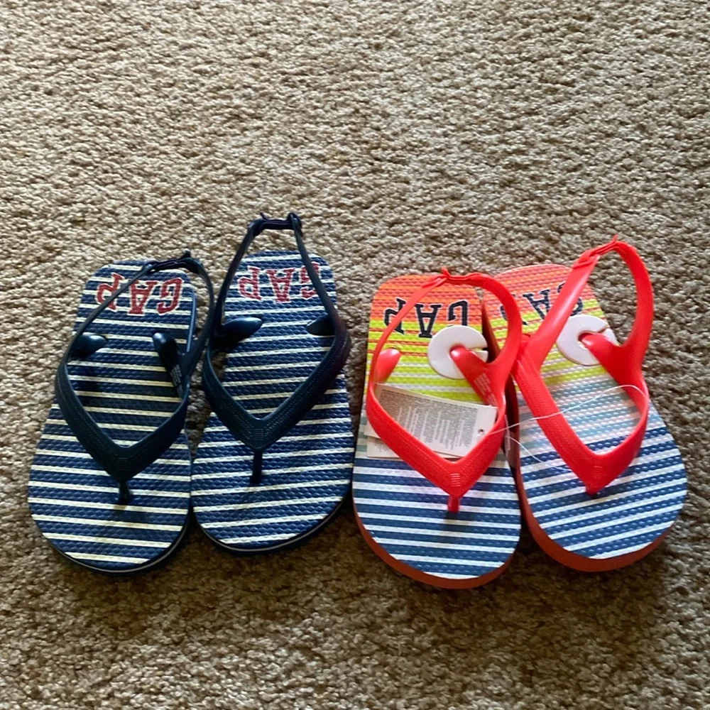 2 pairs Gap flip flops sz 10. NWOT blue/white striped. NWT neon orange striped.